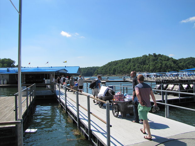 There was a steady stream of people taking carts full of food, beer and other supplies to houseboats and runabouts at Lake Cumberland State Dock on 5/24/2013. Bill Estep photo <br /><br />Read more here: http://www.kentucky.com/2014/01/29/3058693/endangered-fish-found-in-lake.html#storylink=cpy