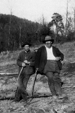 from 9-11 TW his grandpa on the left logging in Pumpkin Creek.jpg